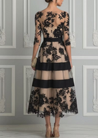 Eva Delune | Vestido Midi Acampanado Elegante